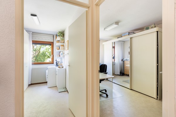 Foto - Te koop: Goed onderhouden tussenwoning in rustige woonwijk!
